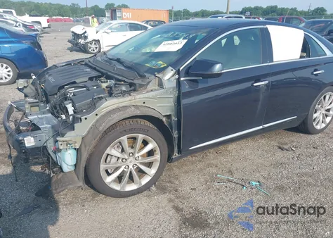 2013 Cadillac Xts Luxury z USA, uszkodzony, nr VIN 2G61P5S39D9239470